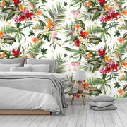 Bedroom - A modern bedroom featuring a neatly made bed with gray bedding, set against a vibrant Decor2Go Wallpaper Mural. A bedside table with a lamp and clock, and a gray cushion on the floor enhance the room.