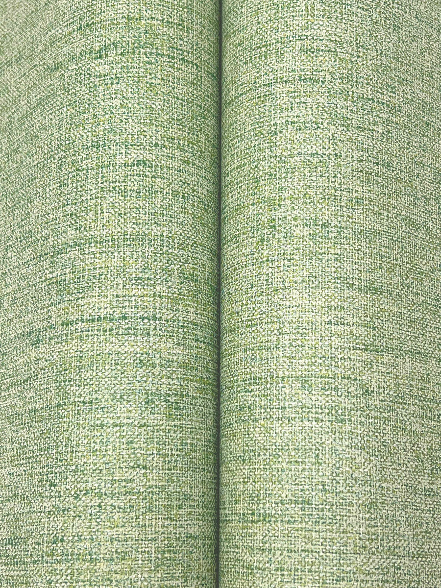 Close-up of York Wallcoverings’ Hillswick Tweed Shamrock Wallpaper (60 SqFt): two rolls in spring green with a subtle woven texture, blending light and dark green for a menswear-inspired, tweed-look wallcovering.