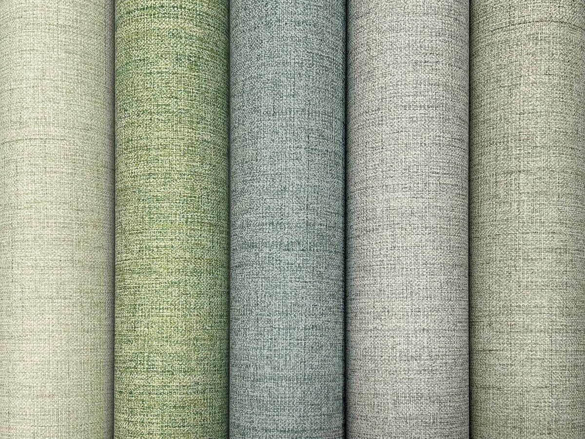 Five rolls of Hillswick Tweed Beige Wallpaper by York Wallcoverings stand vertically side by side, displaying a textured, tweed-like gradient effect in subtle green and gray tones. Each roll covers 60 sq ft.