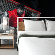 Bedroom - A split image combining two contrasting scenes: on the top, a Decor2Go Hockey Goalie Wallpaper Mural features a goalie in red gear crouching by the goal, while the bottom shows a serene bedroom.