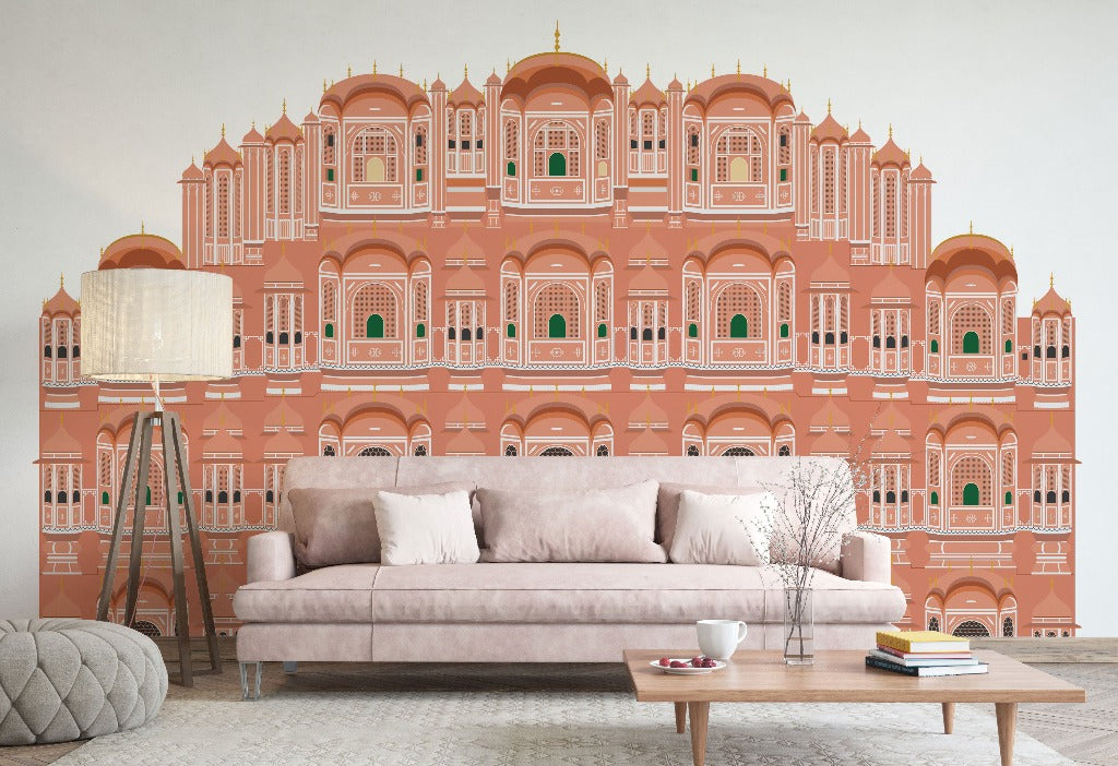 A modern living room features a large sofa in front of an enchanting Decor2Go Wallpaper Mural depicting an ornate, red and gold architectural façade in a traditional Indian style.