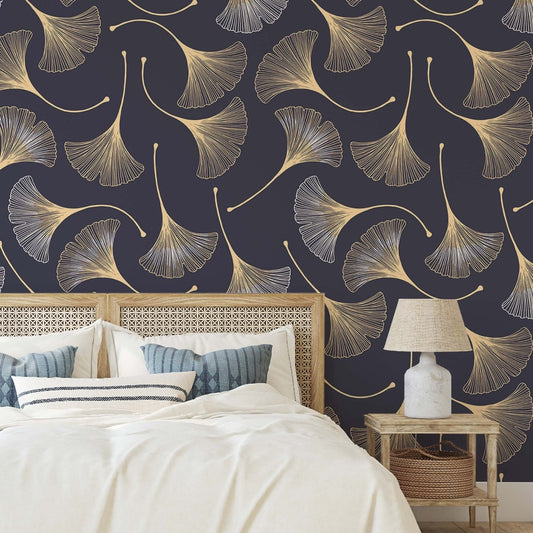 A stylish bedroom featuring an elegant Decor2Go Wallpaper Mural with Japanese Flowers patterns, a white bed with blue cushions, and matching bedside tables with white lamps.