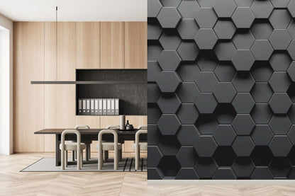 Modern office space with a sleek, minimalist design. The left side features a wooden wall, white shelves adorned with white binders, and a black table paired with white chairs. On the right side, proudly displayed is the Modern 3D Hexagonal Elegance Wallpaper Mural from Decor2Go Winnipeg, showcasing its contemporary sophistication. Light wood floors unify the space.