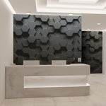 The modern reception area features a sleek, white marble desk and minimalist design. The back wall is adorned with the Modern 3D Hexagonal Elegance Wallpaper Mural from Decor2Go, infusing a geometric touch with its elegant pattern. The ceiling's recessed lighting and layered design further enhance the sophisticated ambiance.