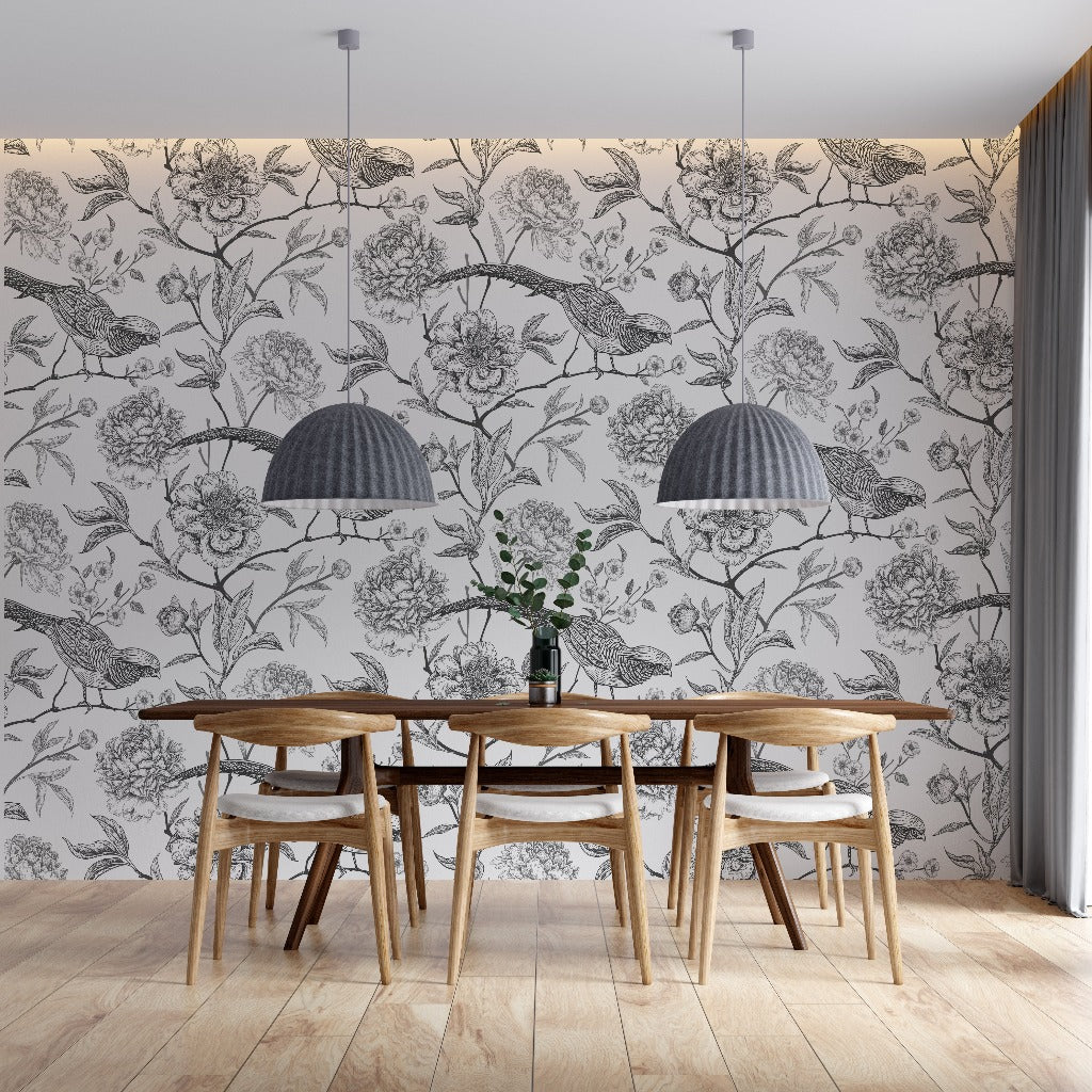 Dining room with black and white wallpaper with birds and flowers