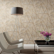 Living Room - A modern with two white chairs, a metallic floor lamp, and a black coffee table holding a vase of purple flowers. The wall features the Neutral & Gold Nazca Wallpaper by York Wallcoverings, enhancing the contemporary design with its beige geometric pattern