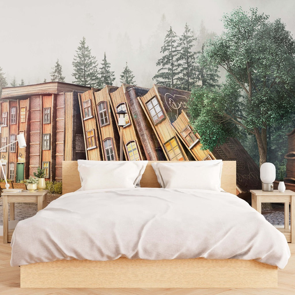 A bedroom with a large Once Upon a Time Wallpaper Mural from Decor2Go Wallpaper Mural of a fantasy bookshelf made to look like buildings and trees, behind a simple bed with white bedding. The overall theme evokes a children's room decor.
