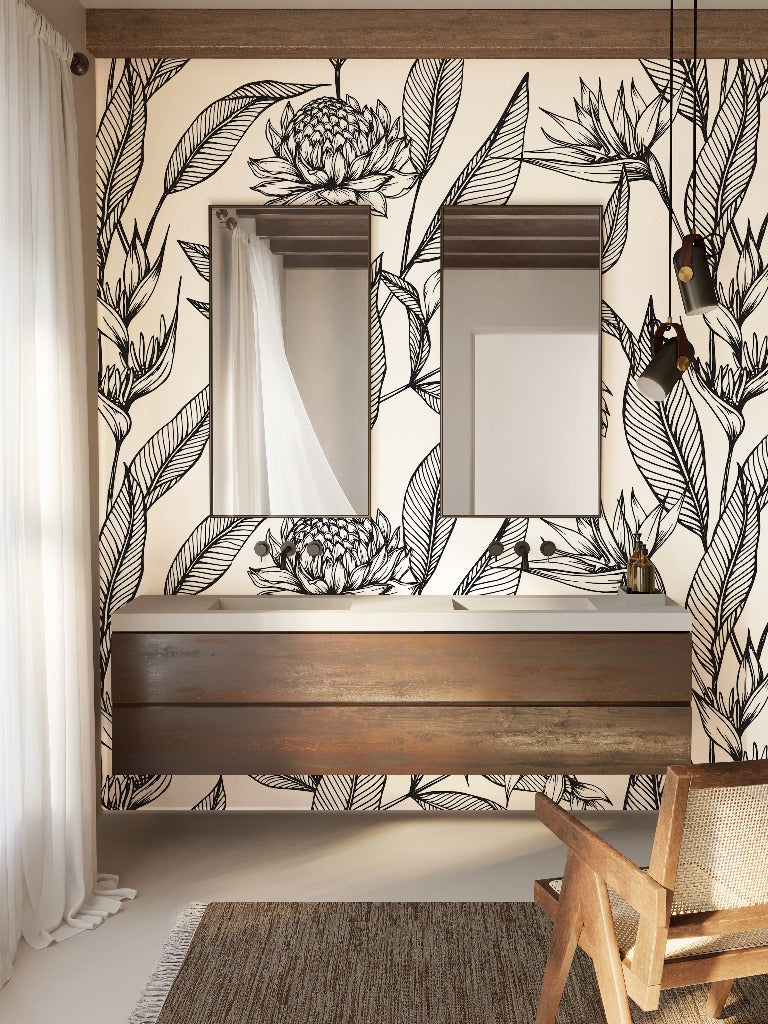 A stylish bathroom featuring a large Decor2Go Wallpaper Mural Paradise Flower wallpaper, double wooden vanity with two sinks and square mirrors, accented by natural wood beams and a wooden chair.