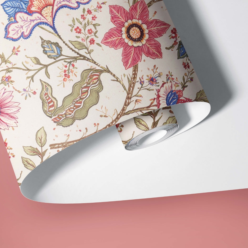 Roll of floral wallpaper with a colorful design on a pink background