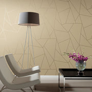 Living Room - A modern with Pearl & Gold Nazca Wallpaper by York Wallcoverings features two white chairs and a geometric-patterned beige wall. A tall gray floor lamp complements minimalist decor, while a black coffee table with a vase of purple flowers adds color
