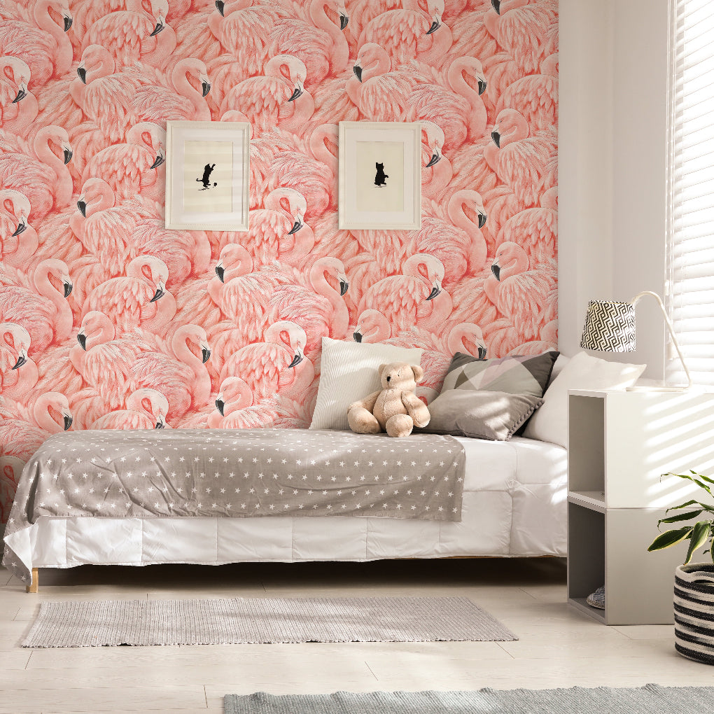 Bedroom - A cozy bedroom features Decor2Go's Pink Flamingos Mural Wallpaper, adding coastal charm. The single bed is adorned with gray and white bedding, cushions, and a plush teddy bear. Two framed pictures hang above while soft light filters through the window blinds.