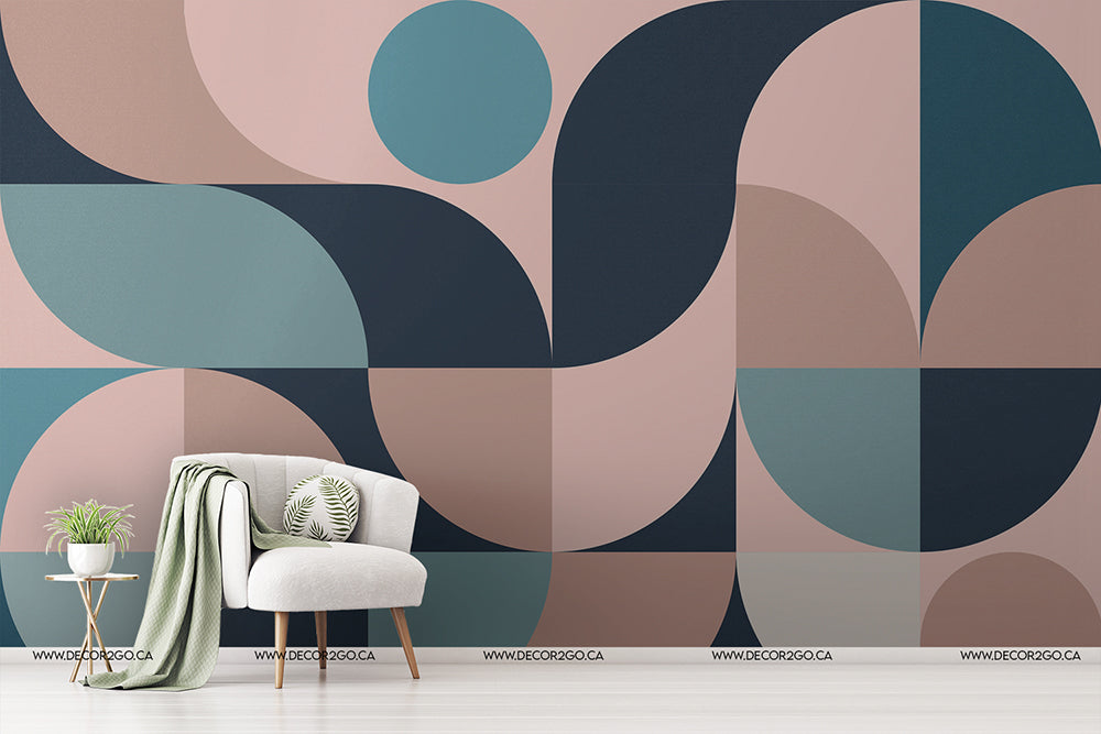 Living Room - A modern living room corner with a stylish armchair draped with a pale green throw, a cushion, and a small side table with plants. The room features a large, artistic Retro Style 60s Mural Wallpaper from Decor2Go Wallpaper Mural.