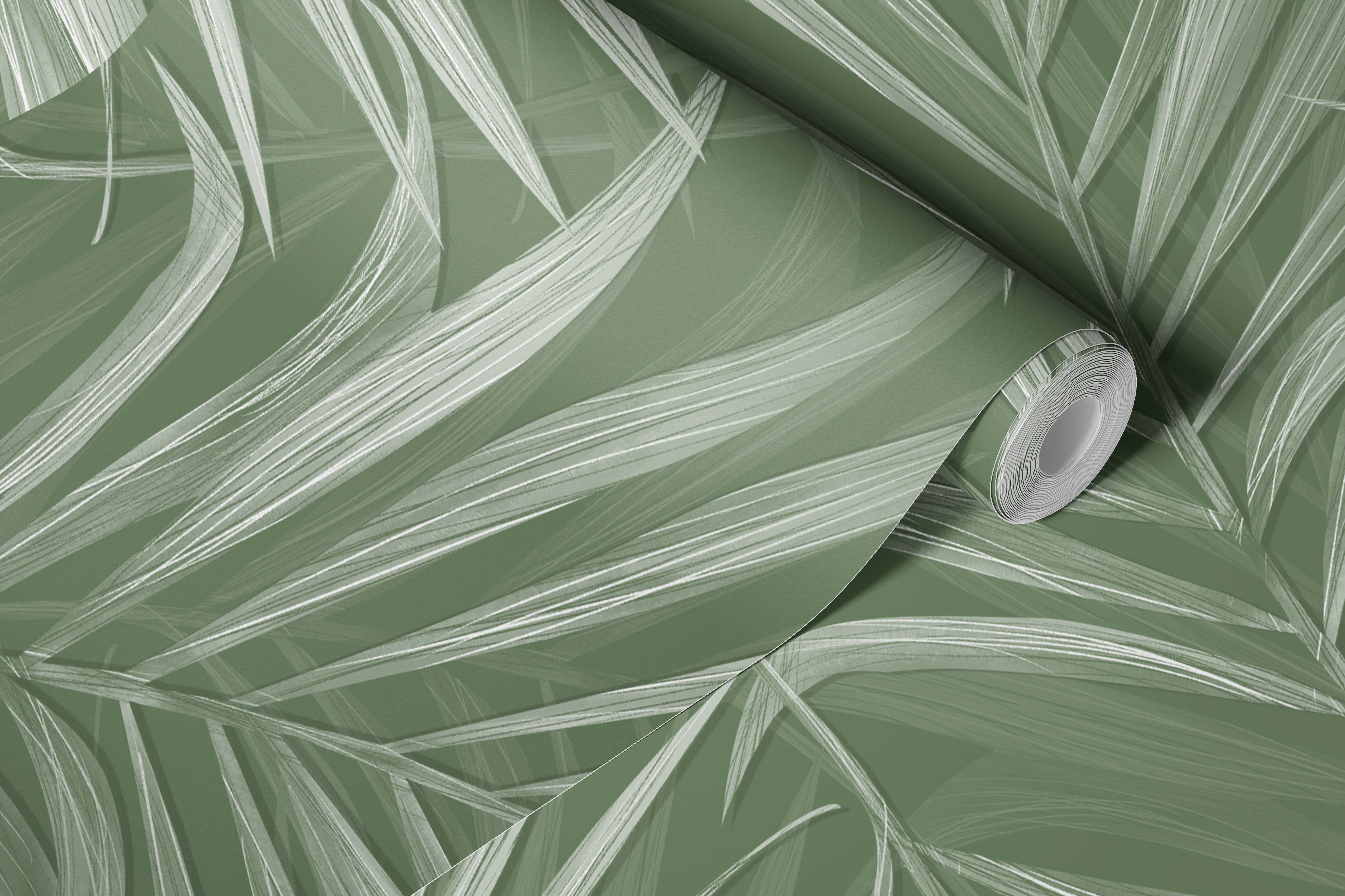 Roll of green wallpaper with white leaf pattern