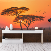 Bedroom - A modern bedroom interior with a large Decor2Go Wallpaper Mural featuring acacia trees and flying birds, a stylish desk with decor, and a white floor.