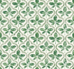 A seamless pattern composed of green, four-leaf clovers arranged in a symmetrical design against a beige and white background. The clovers are outlined with a white border, giving them a hand-painted look. This Sevilla River Rock Wallpaper Grey (60 Sq.Ft.) repeats uniformly across the entire York Wallcoverings SureStrip Substrate for easy application.