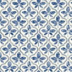 A seamless pattern with a vintage look featuring blue, symmetrical, four-leaf motifs. Each leaf set is encased within a beige and white ornate, curved diamond shape, creating an intricate, repeating design perfect for Sevilla Cobalt Wallpaper Blue (60 Sq.Ft.) by York Wallcoverings that exudes geometric elegance.