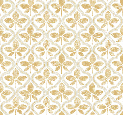 A repeating pattern of golden clover-shaped motifs with a slightly distressed texture on a white background. The design, featured in the Sevilla River Rock Wallpaper Grey (60 Sq.Ft.) by York Wallcoverings, exudes geometric elegance and is symmetrical, creating a uniform and sophisticated look.