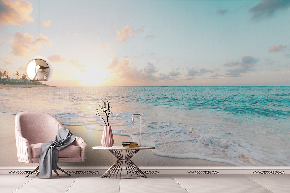 Living Room - A modern living room setup featuring a pink armchair and side table with decor, facing a large Decor2Go Wallpaper Mural of a serene beach landscape at sunset.