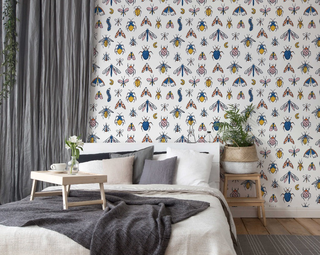 Bedroom - Modern bedroom with a vibrant Decor2Go Wallpaper Mural, a bed covered in gray linens, a wooden bedside table with a plant and coffee cup, and gray curtains.