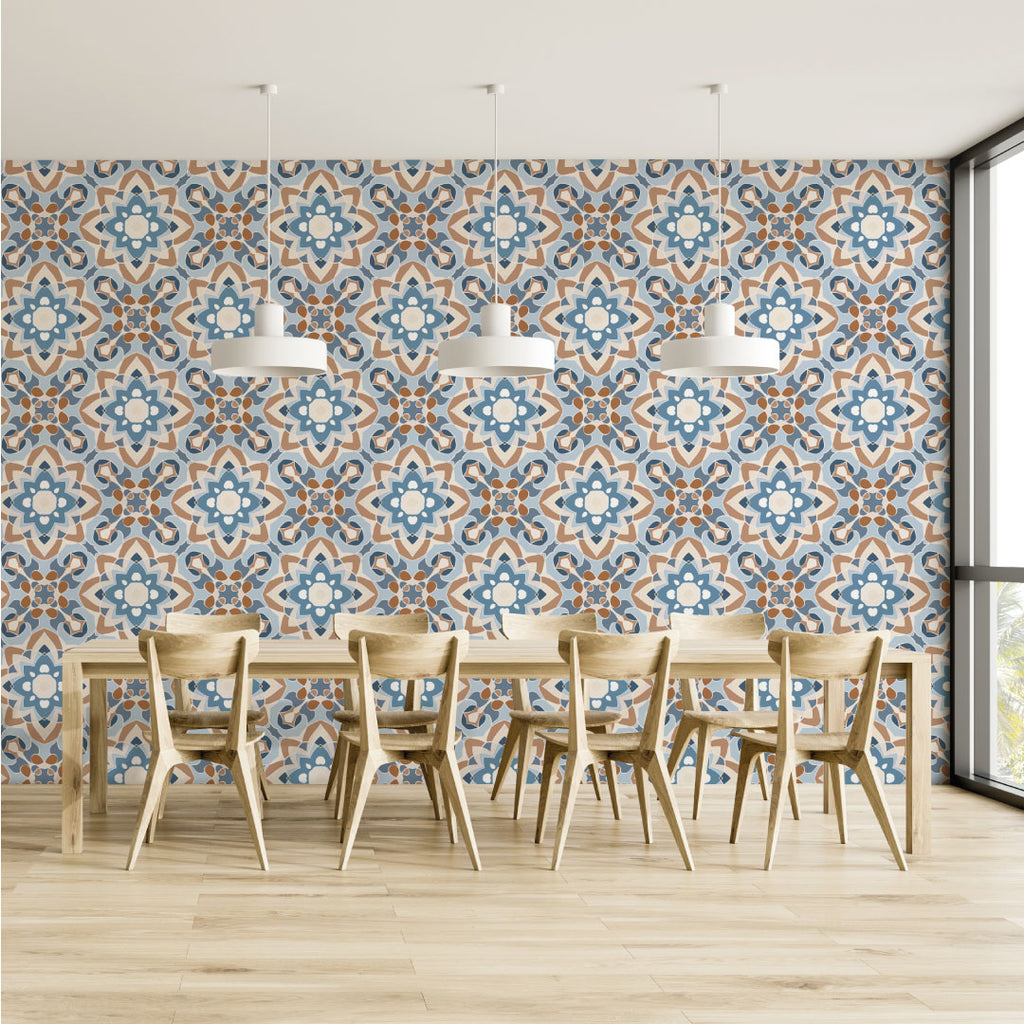 Modern dining room featuring a wooden table with chairs, Decor2Go Wallpaper Mural Moroccan-style tile wall, three hanging lamps, and large windows with a city view. Light wooden flooring complements the bright interior.