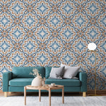 A cozy living room featuring a teal sofa with gray cushions, set against a feature wall with Decor2Go Wallpaper Mural's Tile Wallpaper II Wallpaper Mural. A round wooden coffee table and a modern lamp complete the scene.