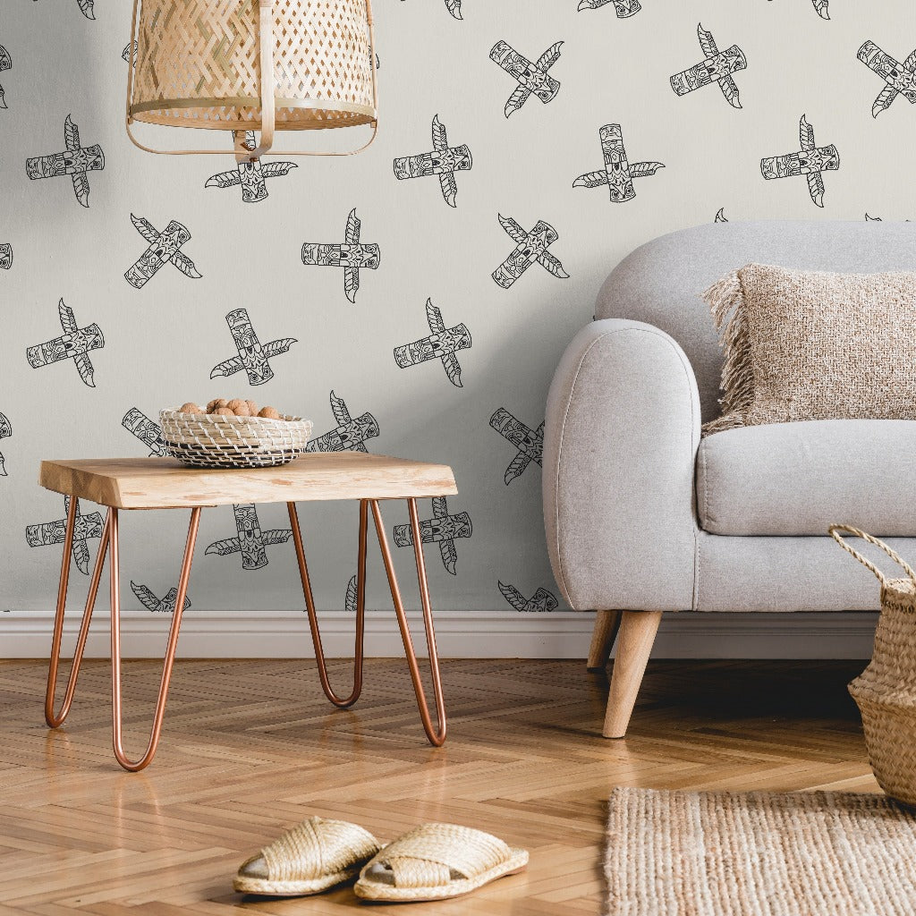 A cozy living room corner featuring a gray sofa, a wooden side table with copper legs, rattan slippers on the floor, and Decor2Go Wallpaper Mural reflecting Canadian culture.