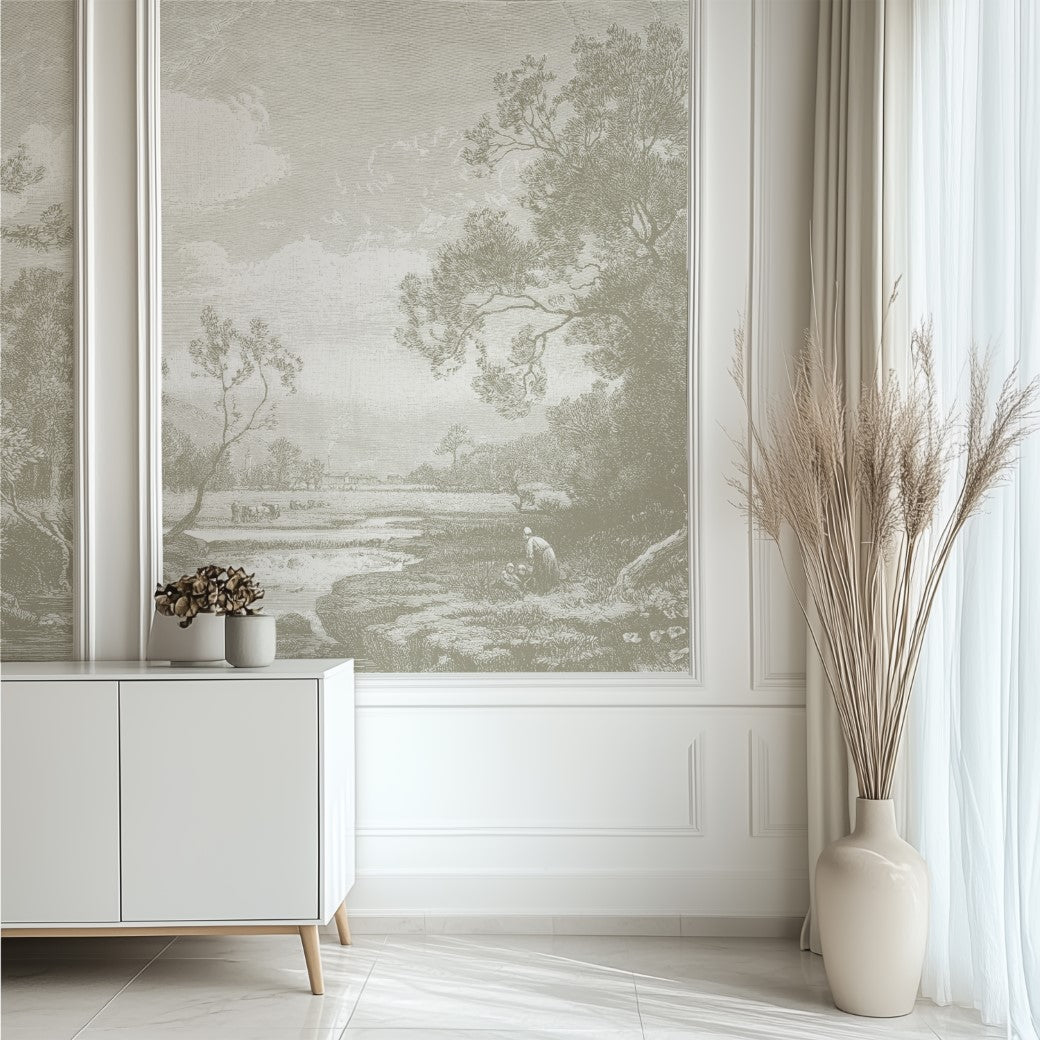 Living Room - A serene living room features the "Tranquil Horizons Scenic Wallpaper Mural" by Decor2Go, portraying a peaceful landscape with trees and a river. A white sideboard holds a small plant, while a tall vase of dried grasses stands near sheer curtains.