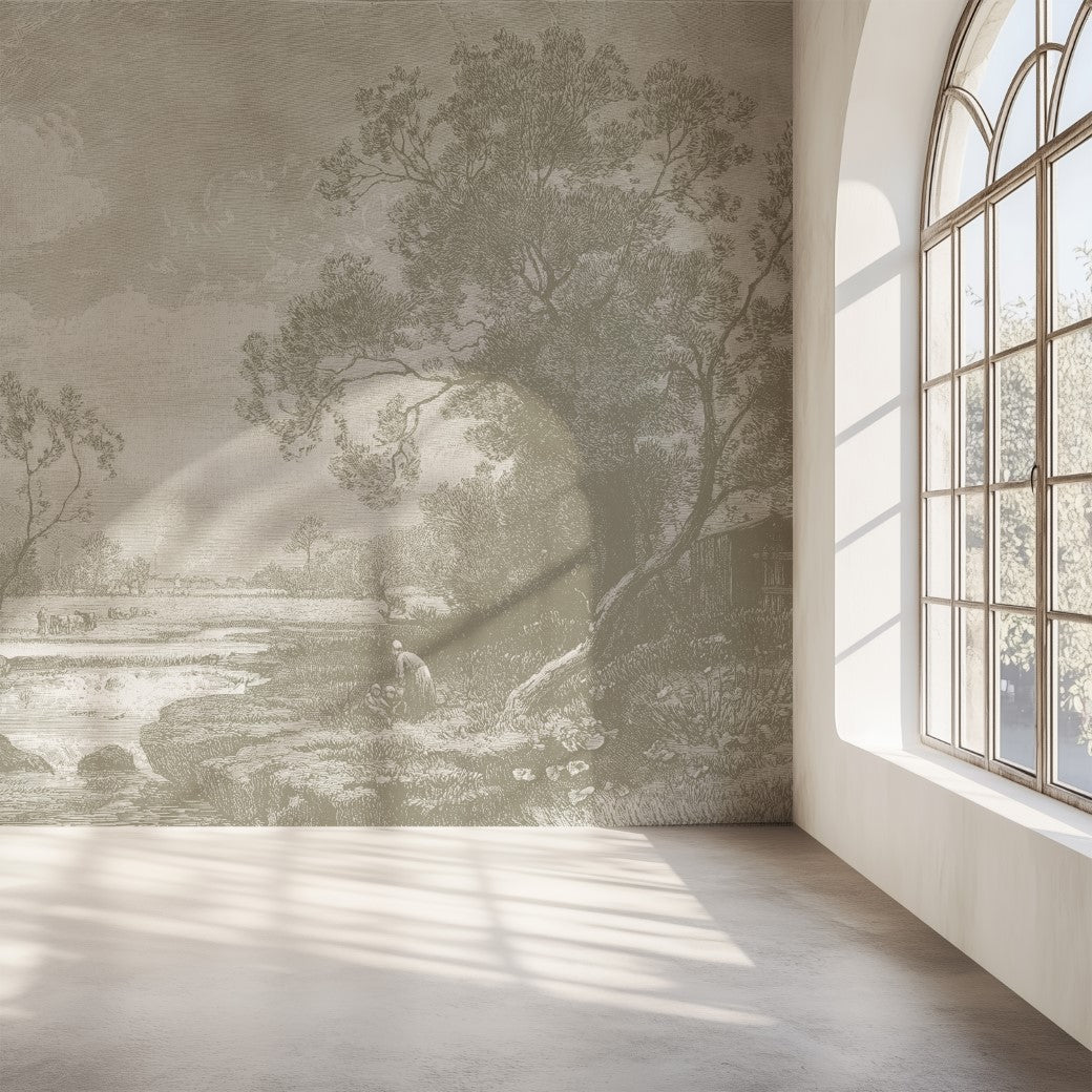 A sunlit room features a large arched window, casting shadows on the floor. The "Tranquil Horizons Scenic Wallpaper Mural" by Decor2Go showcases a pastoral landscape with trees and a riverbank figure. The spacious, empty room offers a serene space to unwind.