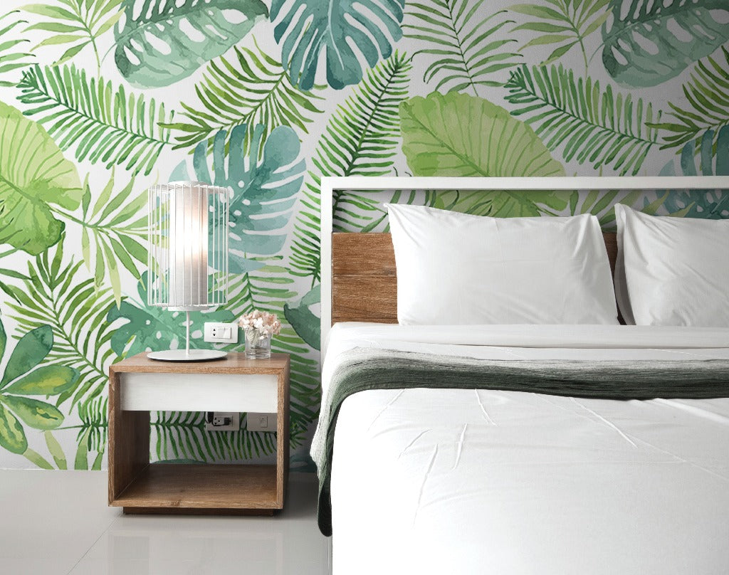 Bedroom - Green tropical leaves pattern wallpaper mural. Seamless floral leaves wallpaper murals in the bedroom