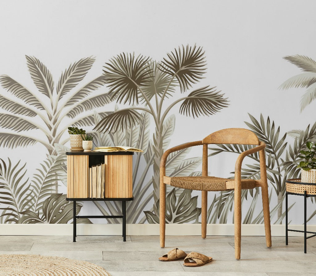 A cozy modern room corner featuring a stylish wooden chair and a matching side cabinet with plants and books on it, set against a wall with a large Decor2Go Wallpaper Mural. A woven mat and sandals.
