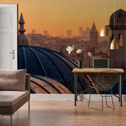 Home Office - A modern home office space with a large window overlooking a cityscape at sunset. The room features a sleek desk, a laptop, a comfortable chair, and stylish lighting with Decor2Go Wallpaper Mural.