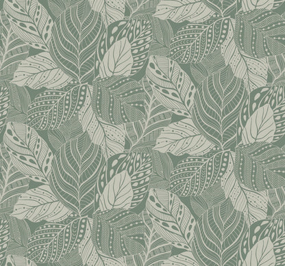 A seamless patterned design featuring an array of leaves with intricate line details and varying textures. The leaves are primarily in shades of green and white, creating an organic and natural aesthetic. This Vinca Smokey Blue Wallpaper Blue (60 Sq.Ft.) by York Wallcoverings is made from a durable material that is easy to hang and remove.