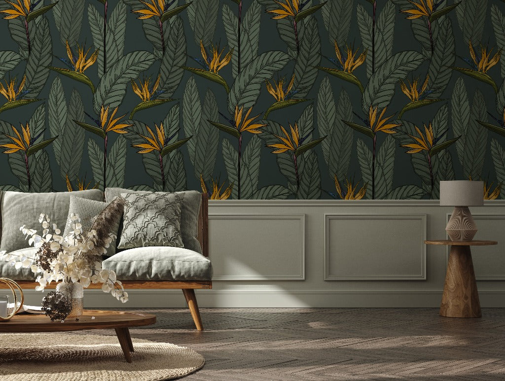 Living Room - A stylish living room featuring a gray tufted sofa against a wall with bold, Decor2Go Wallpaper Mural. A wooden coffee table with a glass vase and round side table complement the modern decor.