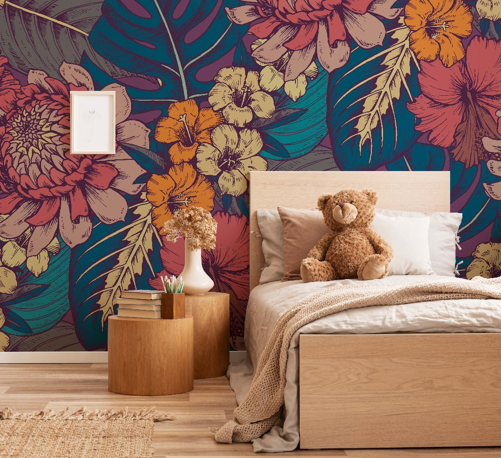 A cozy bedroom featuring a wooden bed with beige linens and a knitted throw, a bedside table with books and a vase of flowers, a teddy bear on the bed, and Decor2Go Wallpaper Mural Vintage Pink Wallpaper.