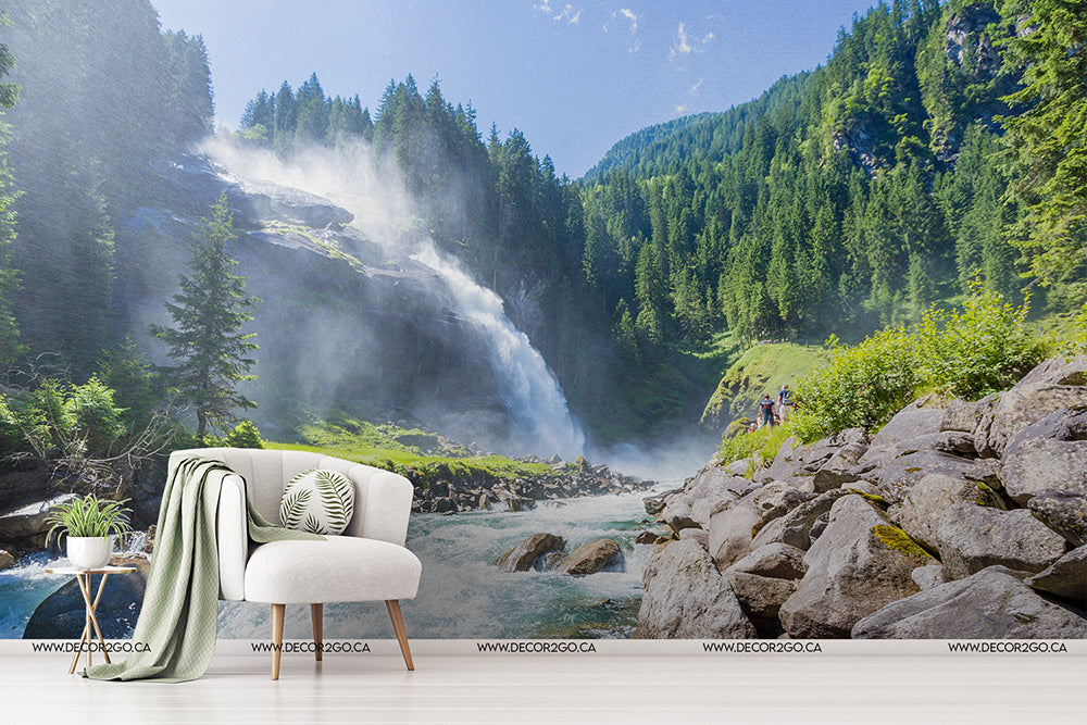 A surreal indoor scene with white furniture and plant decor placed in a natural outdoor setting featuring a Decor2Go Wallpaper Mural Water Spring or Natural Falls wallpaper mural amid lush greenery.