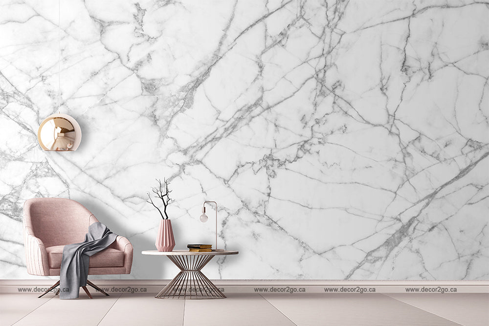 White and black marble wallpaper mural in the living room with pink chair