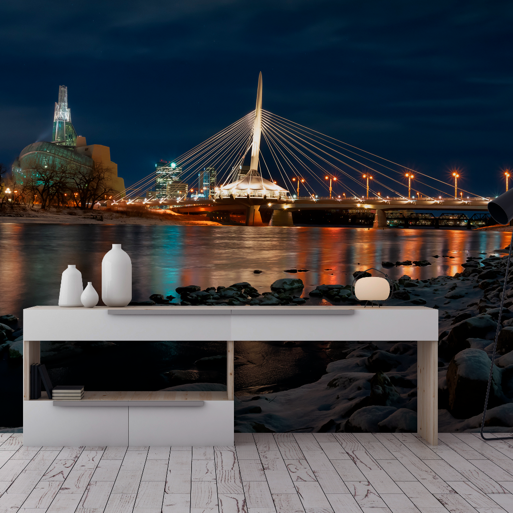 A modern minimalist white console table in a room with a floor-to-ceiling Decor2Go Wallpaper Mural of the Winnipeg in Blues landscape.