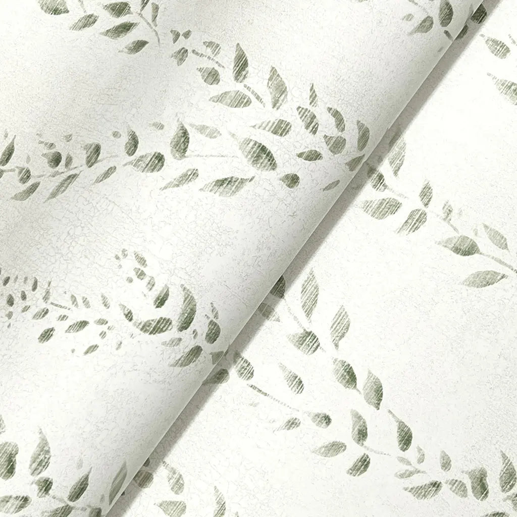 Close-up texture detail of Alpenrose wallpaper in green and white by York Wallcoverings, highlighting its intricate pattern.