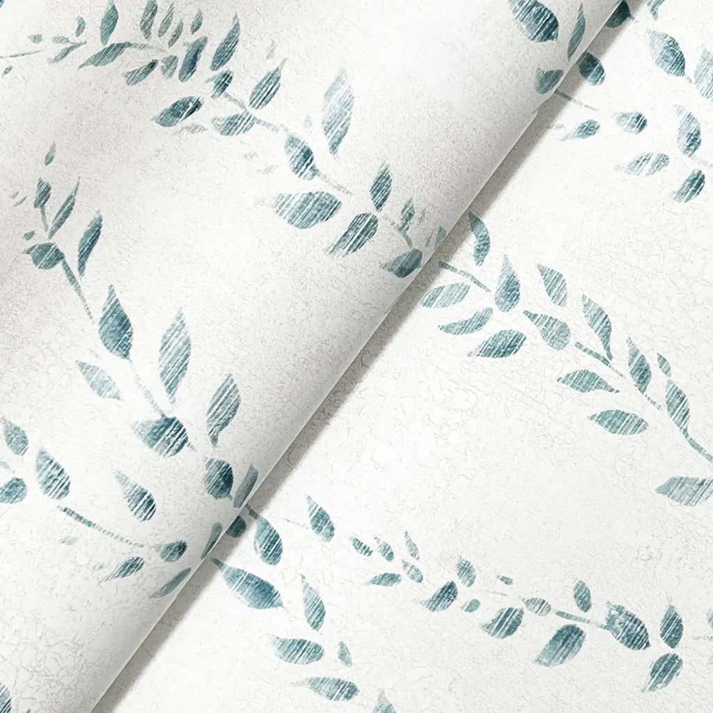 Close-up texture of Alpenrose wallpaper by York Wallcoverings, showcasing intricate detail in teal and white.