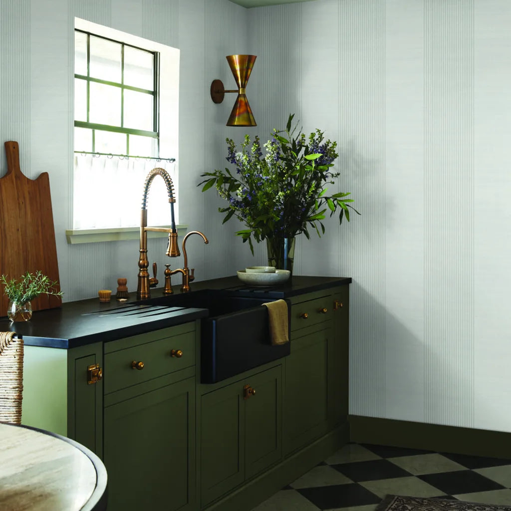 Elegant interior features 'Archer Stripe' Light Grey wallpaper by York Wallcoverings, adding subtle texture to the room.