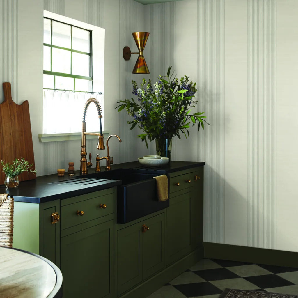 Interior photo features elegant York Wallcoverings Archer Stripe wallpaper in Warm Ivory and Grey, enhancing the room's design.
