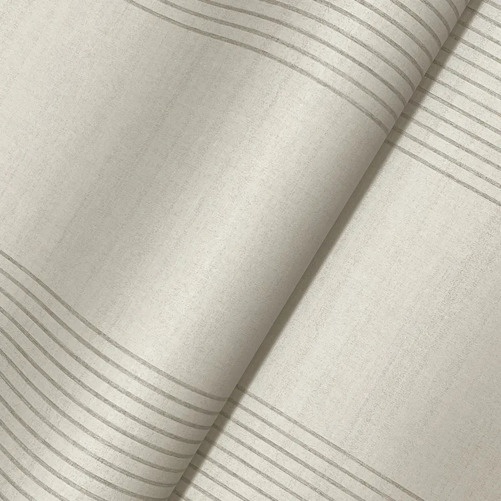 Close-up texture detail of York Wallcoverings' Archer Stripe wallpaper in warm ivory and grey.