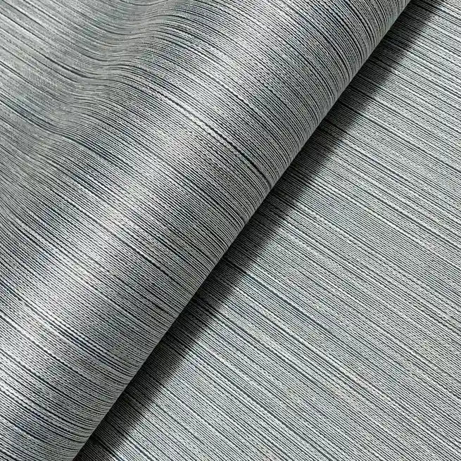 Intricate texture detail of Atticus wallpaper in Slate Blue by York Wallcoverings, showcasing its premium quality.