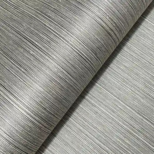 Detailed close-up of Atticus Greige wallpaper by York Wallcoverings, showcasing its rich, tactile texture and quality.