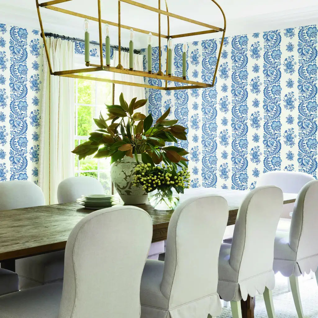 Elegant dining room featuring Beaumont wallpaper in Blue, White by York Wallcoverings, enhancing the room's sophisticated style.