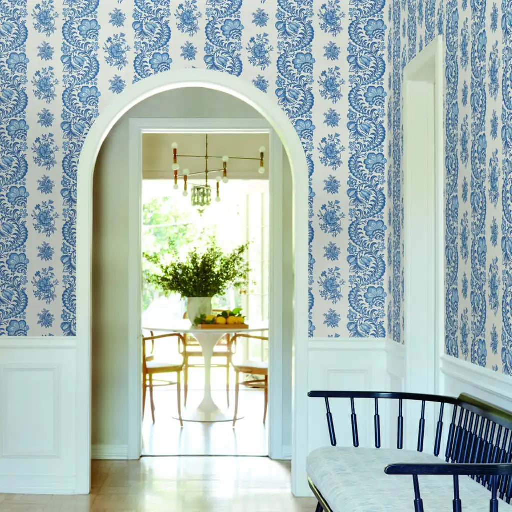 Entryway photo showcasing "Beaumont" wallpaper in blue and white by York Wallcoverings.
