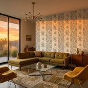 Living Room - Elegant living space featuring Beaumont wallpaper in a sophisticated grey and cream pattern by York Wallcoverings.
