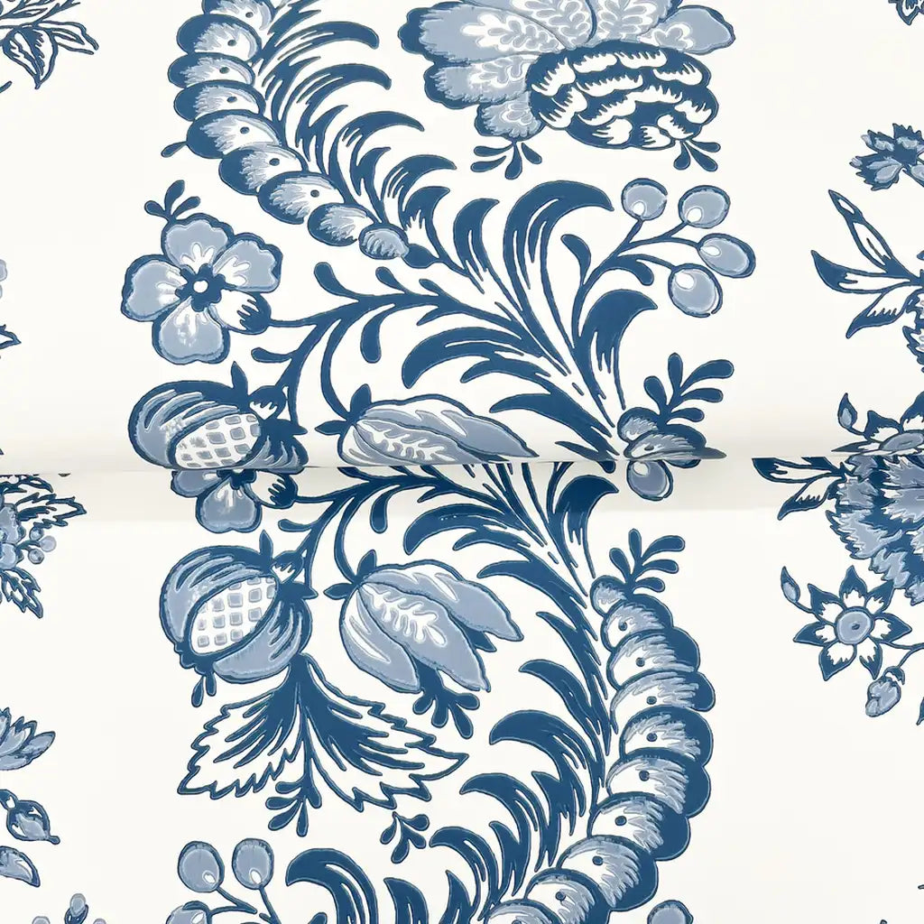 Close-up texture detail of Beaumont wallpaper by York Wallcoverings, showcasing its intricate blue and white pattern.