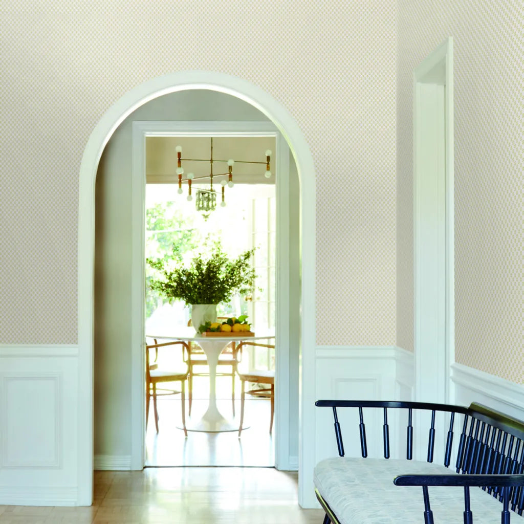 Elegant entryway features Brioni wallpaper in Cream, Yellow by York Wallcoverings, creating a warm and inviting first impression.