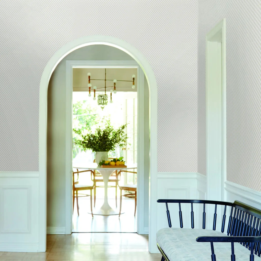 Elegant entryway features Brioni wallpaper in White, Cream by York Wallcoverings, creating a sophisticated and welcoming space.
